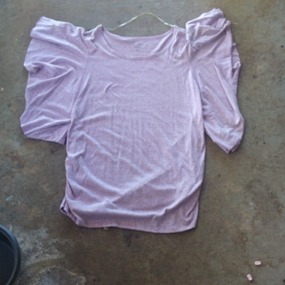 A large light pink Maternity shirt